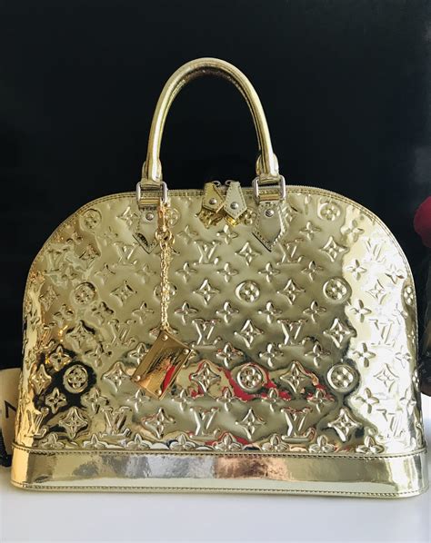 louis vuitton bag gold plate|louis vuitton over shoulder bag.